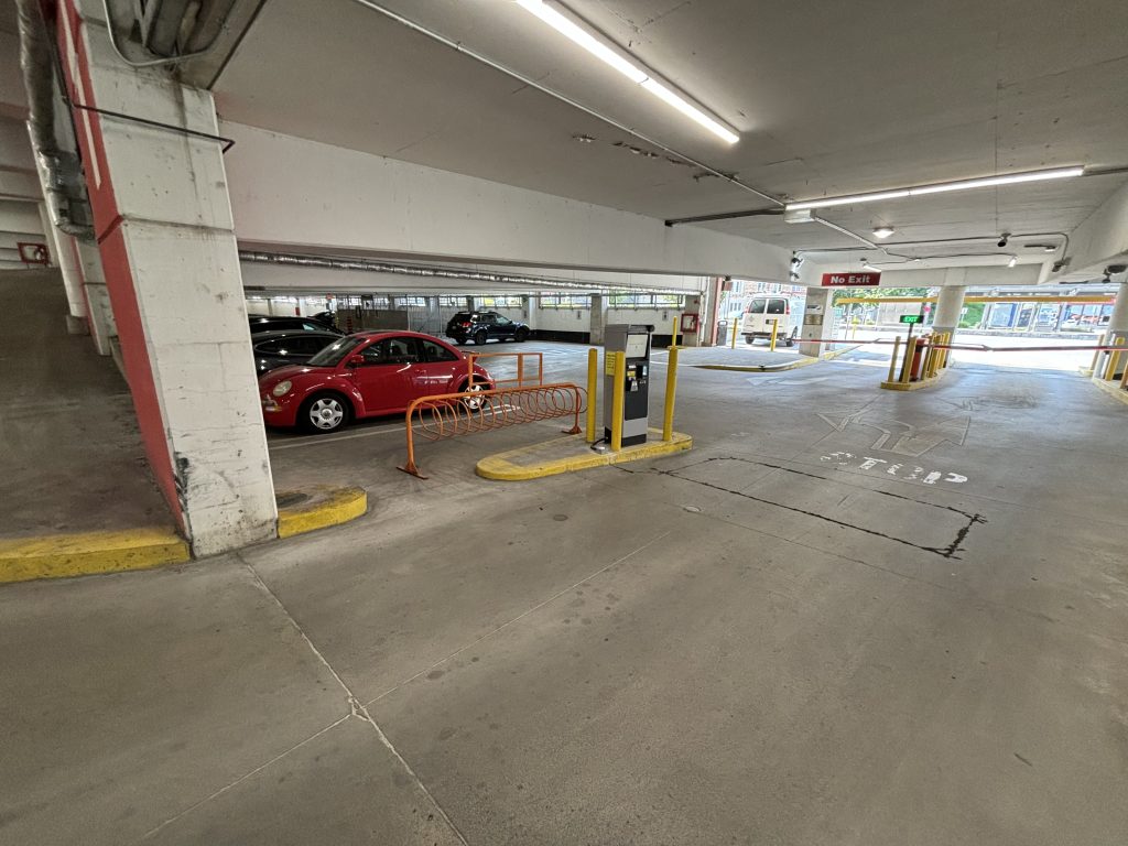photo of bike rack near parking gate in municipal parking garage in Kitchener, Ontario