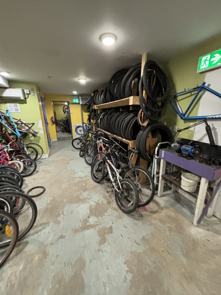 Photo of bike wheel storage at Recycle Cycles